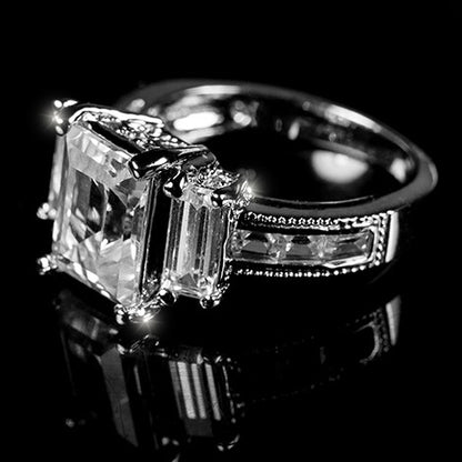Alina 9x7mm Emerald CZ Three Stone Engagement Ring | 2.5ct | 3.7ct