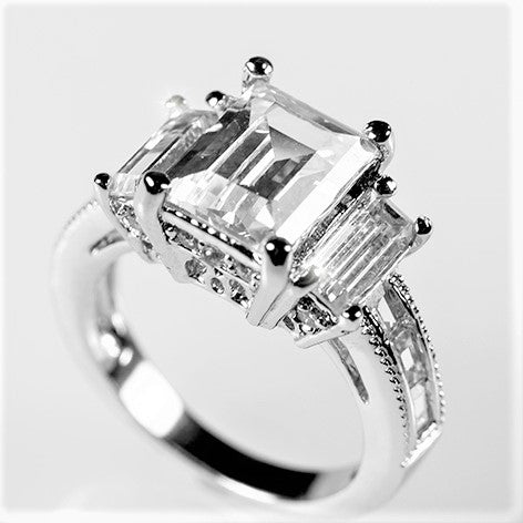 Alina 9x7mm Emerald CZ Three Stone Engagement Ring | 2.5ct | 3.7ct
